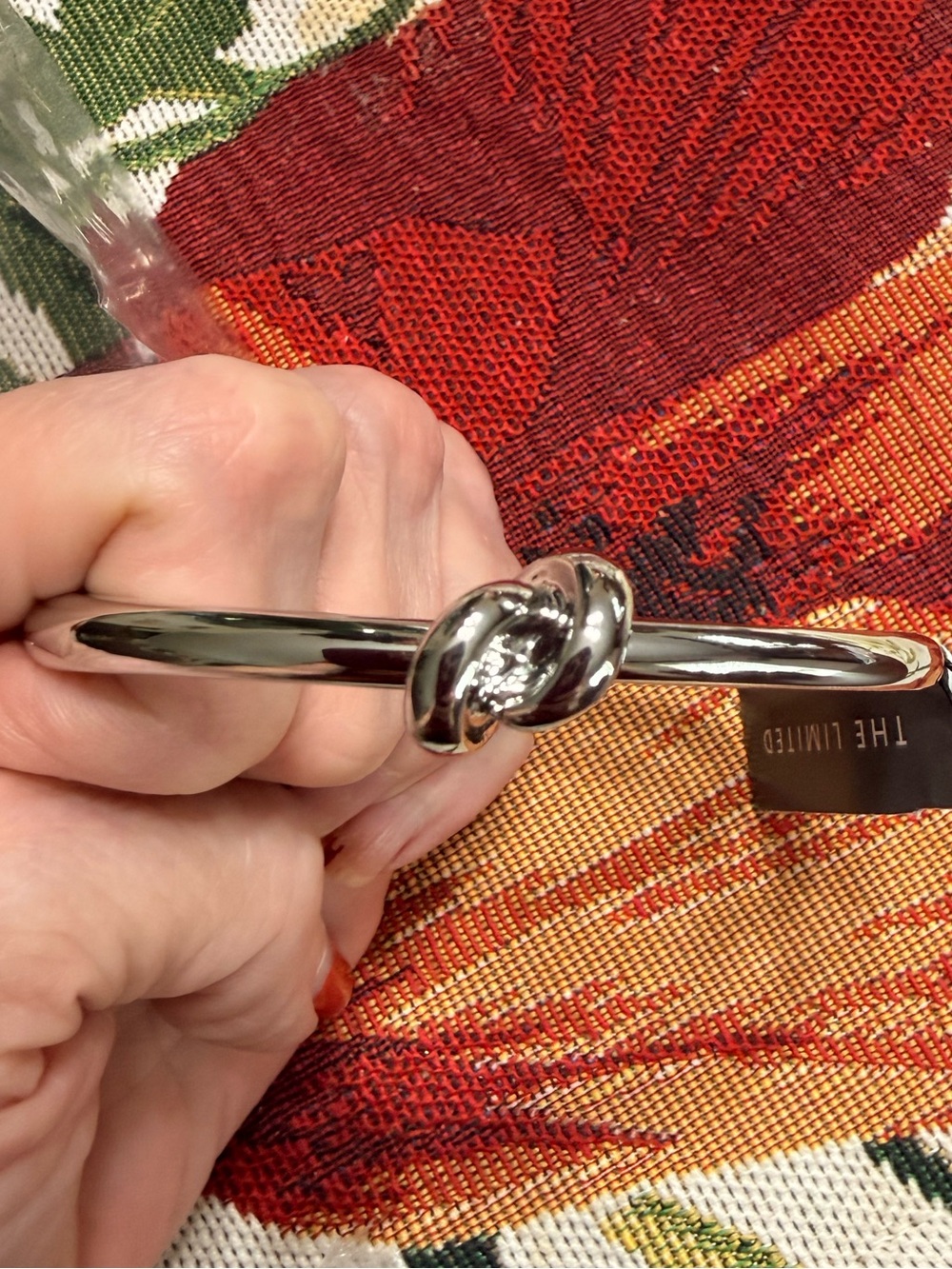 The Limited Silver Knot Bangle Bracelet